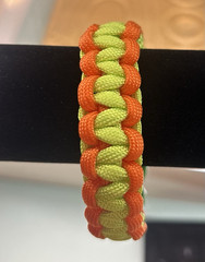 Adjustable Orange & Green Paracord Bracelet w/ Green Buckle, 8 in