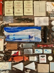 131 Piece Emergency Outdoor Survival Kit with drawstring camo bag