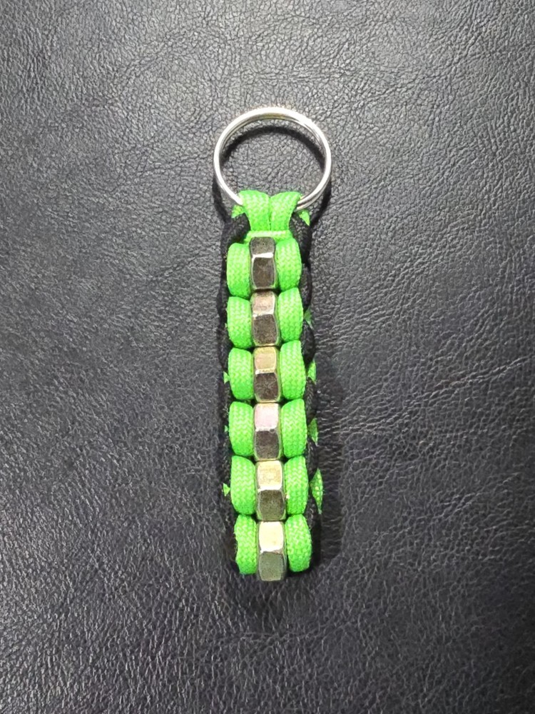 Green and Black Keychain with 6 Gold Bolts With OVER 5 Ft of Paracord