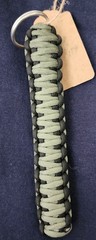 Custom black and green braided paracord keychain. 6″ L w/ split ring keyring