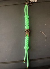 Glow-in-the-dark knife lanyard. Bag, backpack or jacket zipper pull. Angry tooth