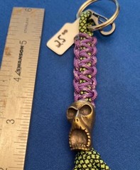 paracord keychain. bag purse, backpack, jacket zipper pull. Screaming skull bead