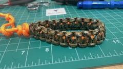 Sparrow’s EDC Collection Paracord Carrier Strap Camo Green/ Orange