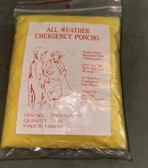 All Weather Emergency Poncho. New In Original Packaging. Yellow Poncho. Reusable