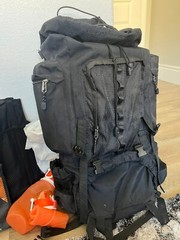 Camping/Hiking Survival Kit Backpack, Sleep Bag, Dish Kit, Chair, Hat, Bottles)