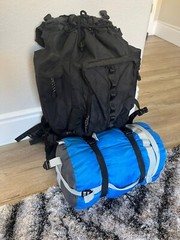Camping/Hiking Survival Kit Backpack, Sleep Bag, Dish Kit, Chair, Hat, Bottles)