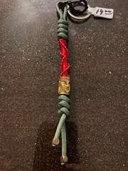 Keychain or knife lanyard. Bag, backpack, jacket zipper pull. Buddhist deities
