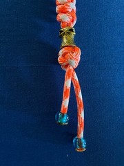 knife lanyard. Bag, backpack or jacket zipper pull. Superhero or Villain bead