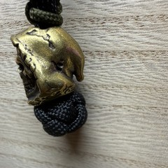 Handmade Black/Green 6 in 550 lb paracord lanyard w/ metal grim reaper bead.