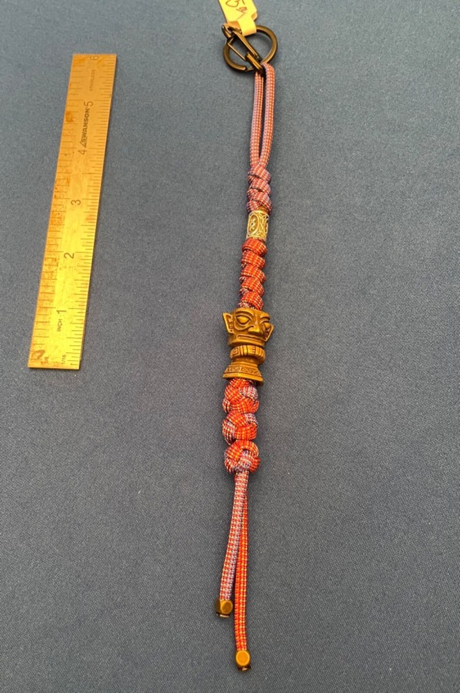 Paracord keychain. backpack, jacket zipper pull. Totem pole or Aztec deity bead