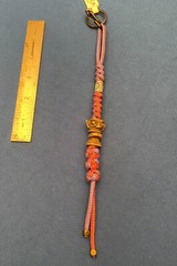 Paracord keychain. backpack, jacket zipper pull. Totem pole or Aztec deity bead