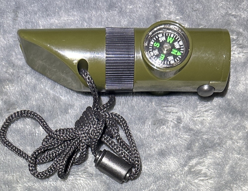 7in1 Camping Survival Whistle Compass Thermometer LED Flashlight Fire Magnifier
