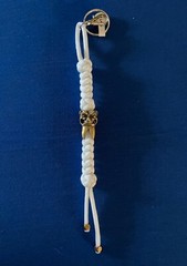 Glow-in-the-dark knife lanyard. Bag, backpack or jacket zipper pull. Angry tooth