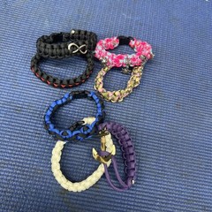 FB2- Lot of 7 Some Cobra Weaved Paracord Bracelets 7-1/2-8” End To End Charms