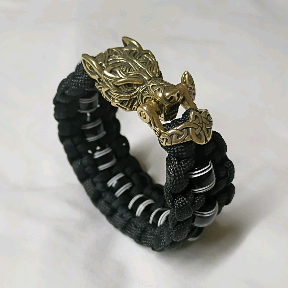 Black Paracord Bracelet with wolf shackle and black and white beads