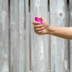 Police Magnum pepper spray .50oz hot pink molded keychain QR defense protection