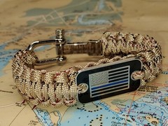 PARACORD SURVIVAL BRACELET WITH AN AMERICAN FLAG, POLICE, FIRE DEPARTMENT, NEW