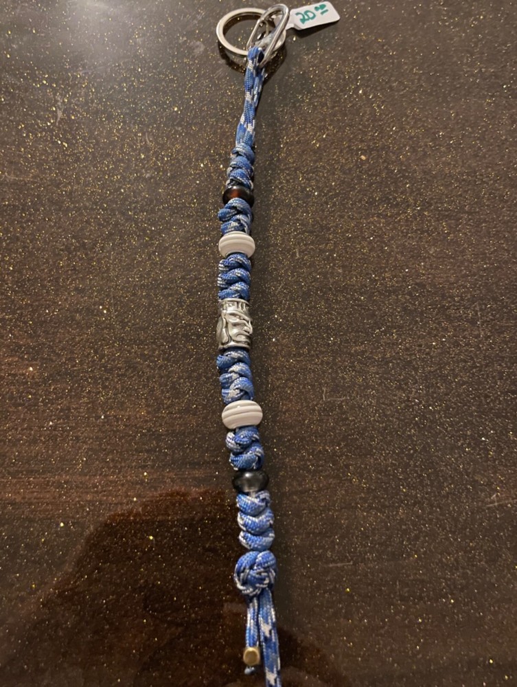 Keychain or knife lanyard. Bag, backpack, jacket zipper pull. Buddhist deities