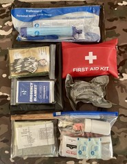131 Piece Emergency Outdoor Survival Kit with drawstring camo bag