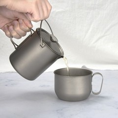 Sleek and Functional Titanium Coffee Cup for Traveling and Backpacking