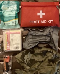 135 Piece Emergency Outdoor Survival Kit with drawstring camo bag