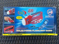 Solar Powered Flashlight Radio with DC12V Charging Socket.