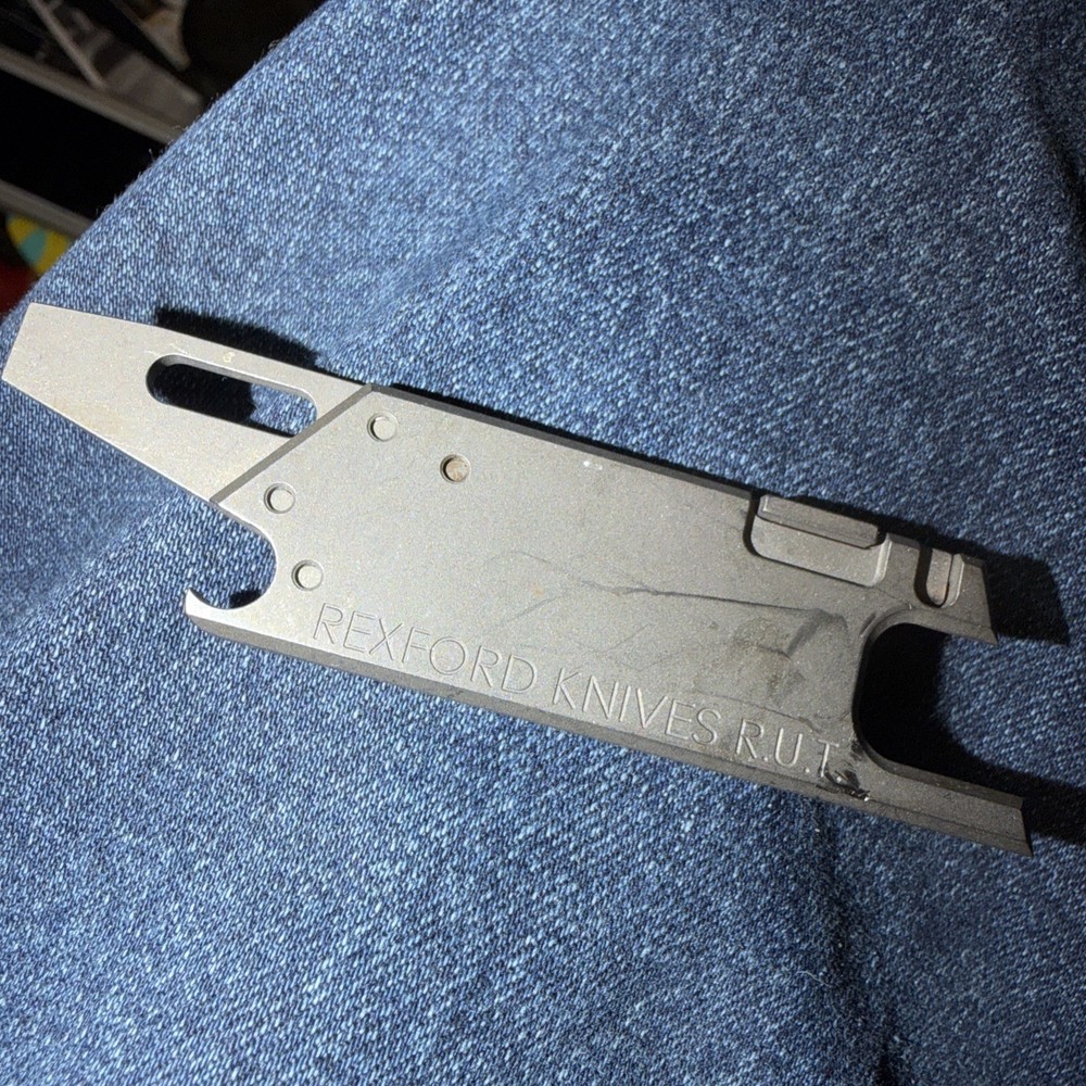 Rexford RUT One Of The First Generation Pieces. Titanium With KYDEX Neck Lanyard