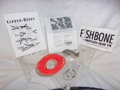 Fish Bone Knotless Rope Tie – Piranha – SEALED NEW IN PACKAGE Orange