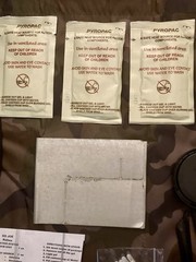 135 Piece Emergency Outdoor Survival Kit with drawstring camo bag